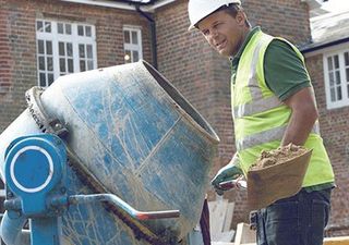 Constructon Worker Mixing Cement - in Chatham, NJ
