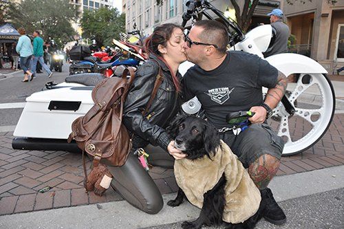 Man And Woman with Dog - Motor Cycle Maintenance in Venice, FL