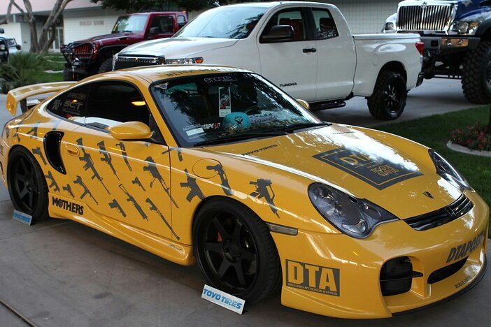 Yellow Car with Guns Design — Upland, CA — So Cal Tint