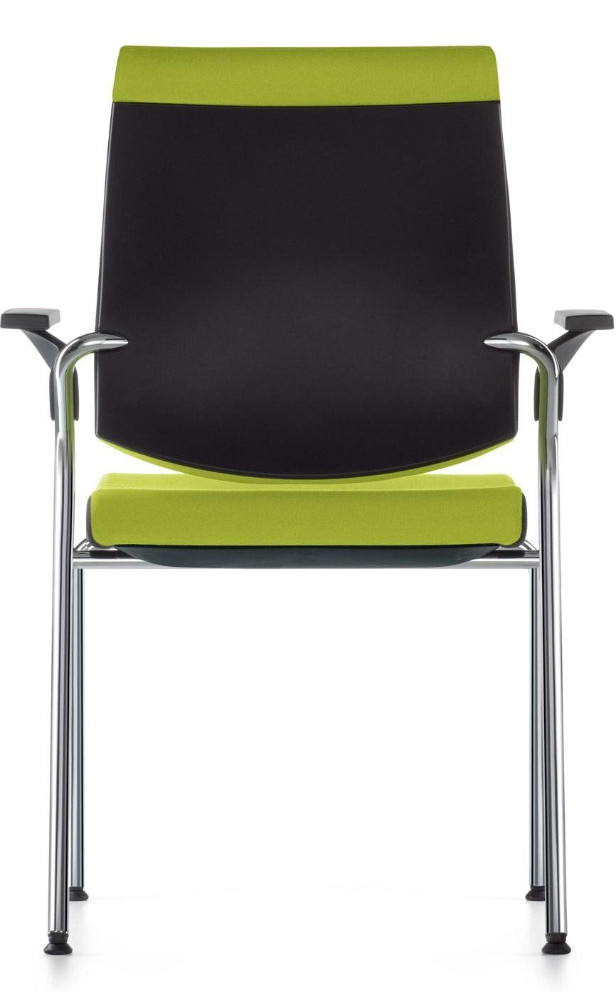 Una moderna sedia da ufficio con schienale nero, sedile e poggiatesta verde lime e struttura in metallo argentato.