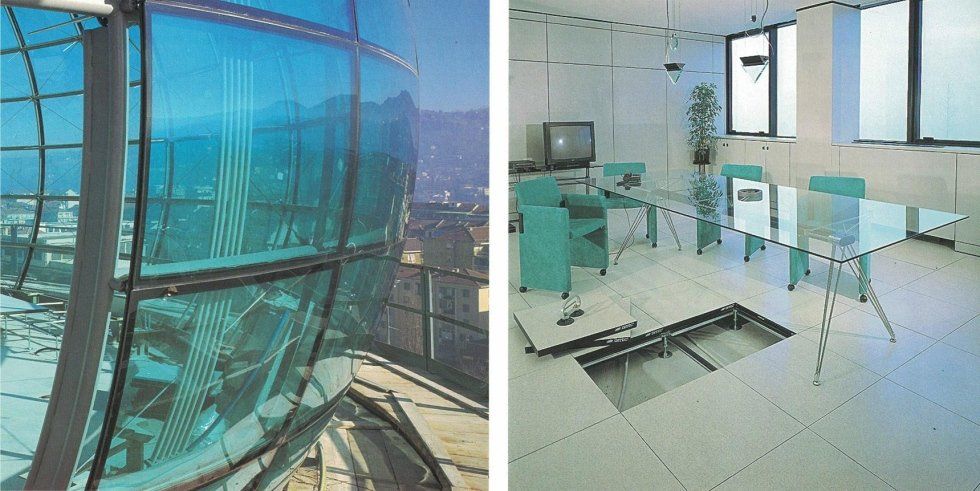 Una vista affiancata che mostra una parete esterna curva in vetro e un ufficio interno con un tavolo con piano in vetro e un pannello a pavimento.