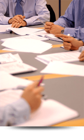 A picture of some people in a meeting