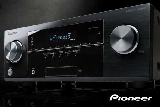 A pioneer stereo receiver is sitting on a table