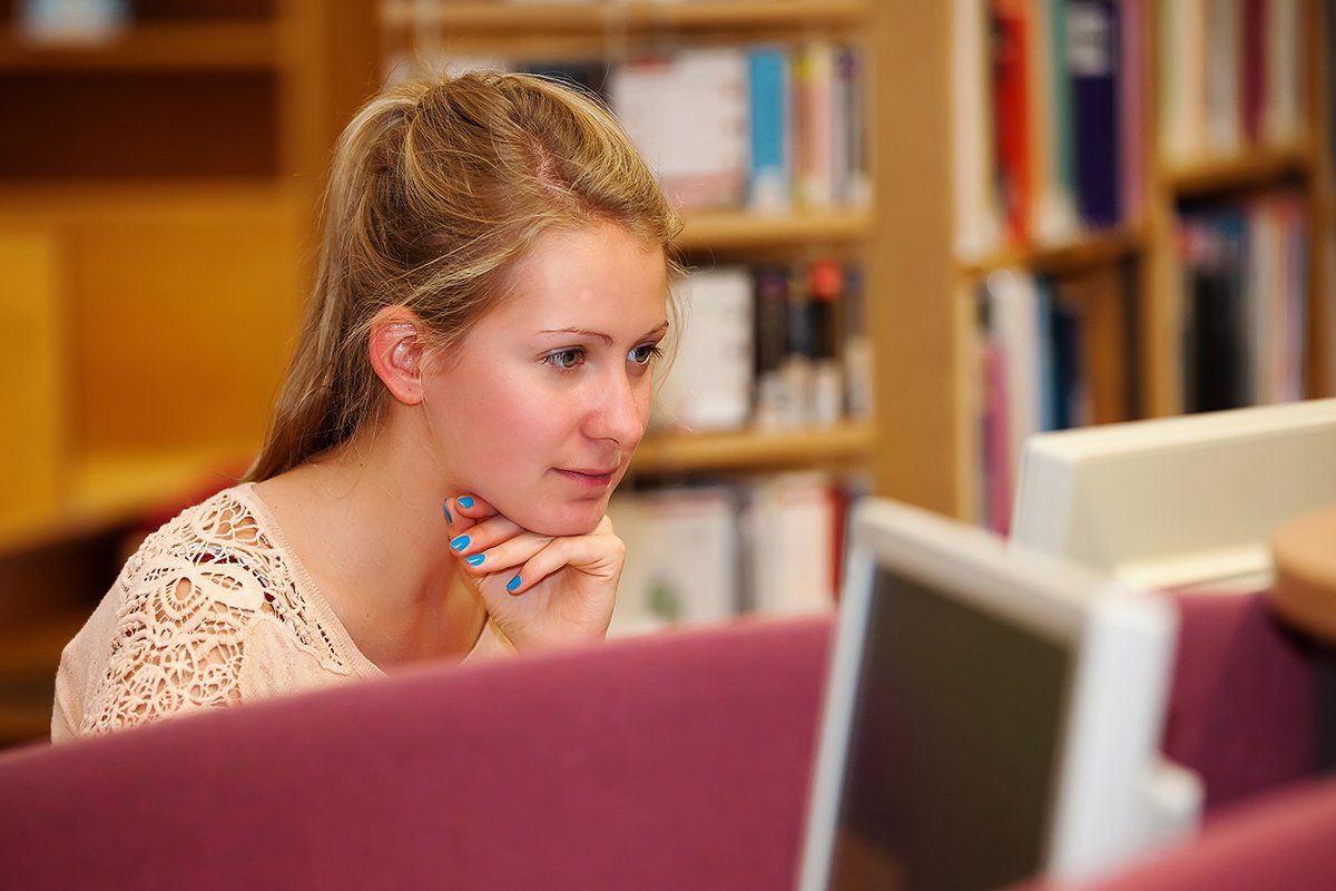School website photography Berkshire Girl in Library