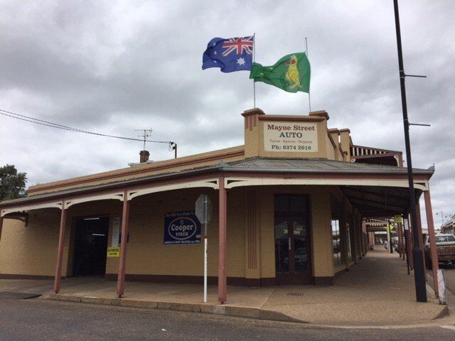 Shop Front with Flags — Mayne Street Auto in Gulgong, NSW