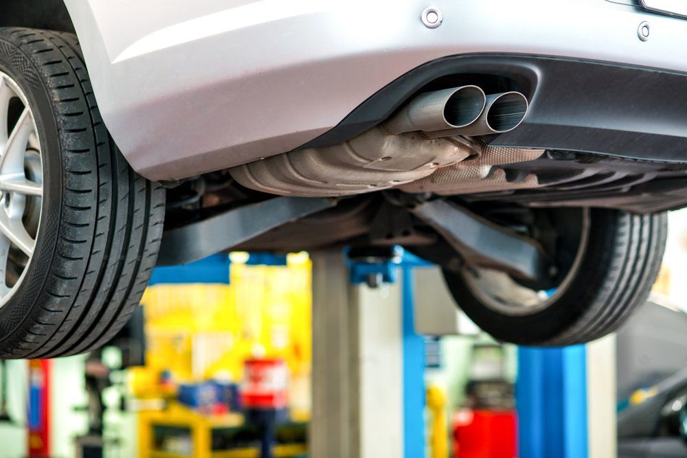 A Car is Sitting on a Lift in a Garage — Mayne Street Auto in Gulgong, NSW