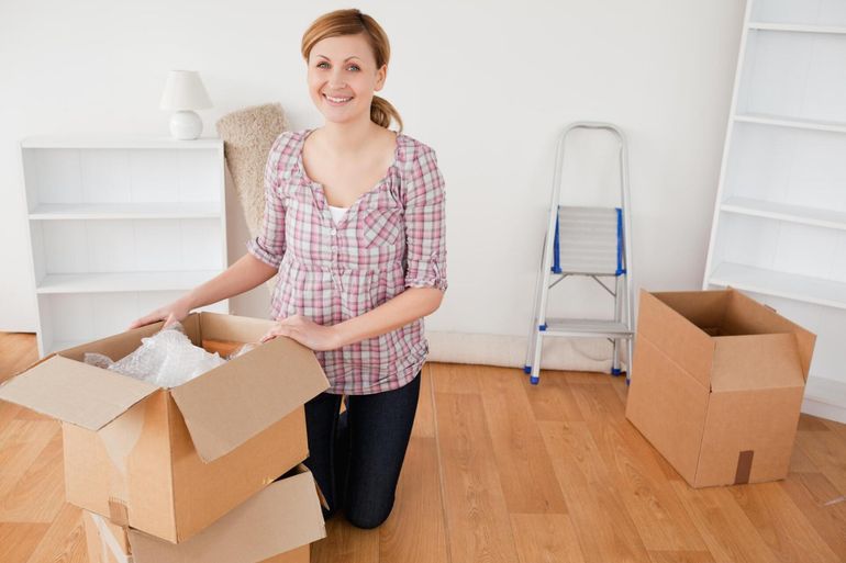 a lady unpacking the box