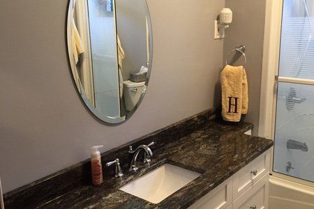 Bathroom Remodeling — Bathroom with Mirror in Amsterdam, NY Bathroom Remodeling — Bathroom with Mirror in Amsterdam, NY