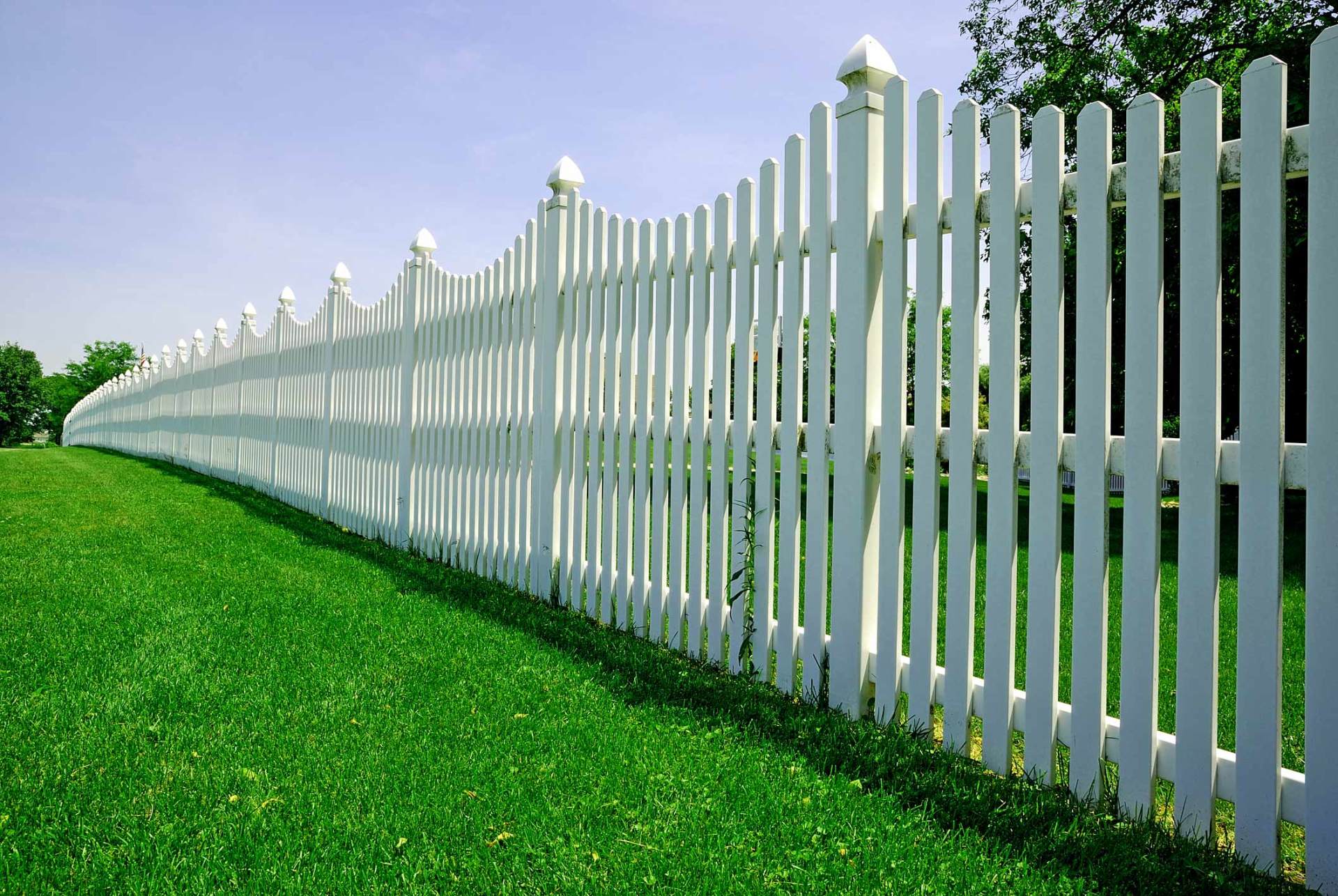 New Fence — White Vinyl Fence Along Roadside in Riverside, CA New Fence — White Vinyl Fence Along Roadside in Riverside, CA