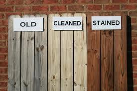 Three vertical wood panels labeled old, cleaned, and stained, showing different finishes
