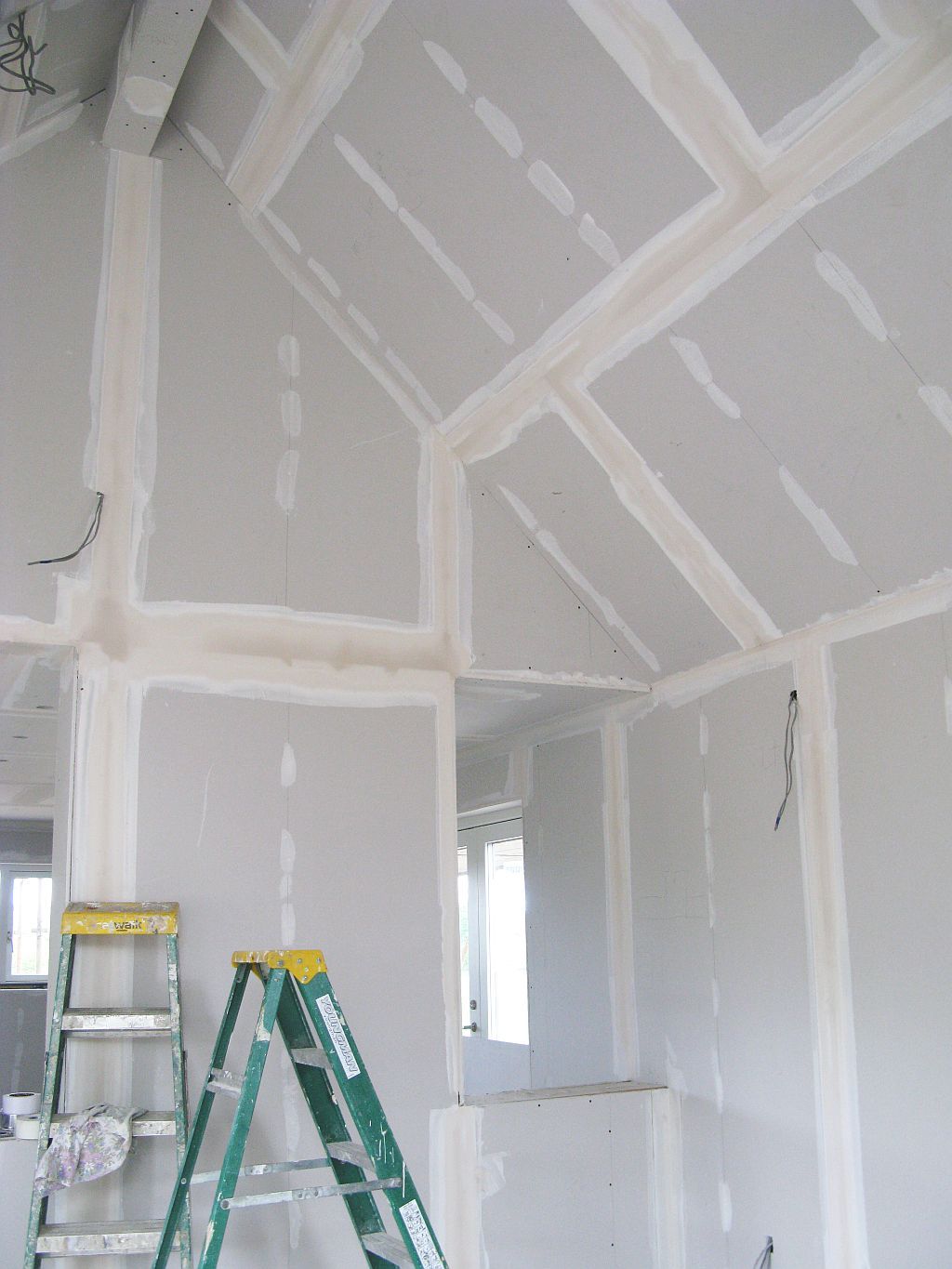 empty room with plasterboard on walls