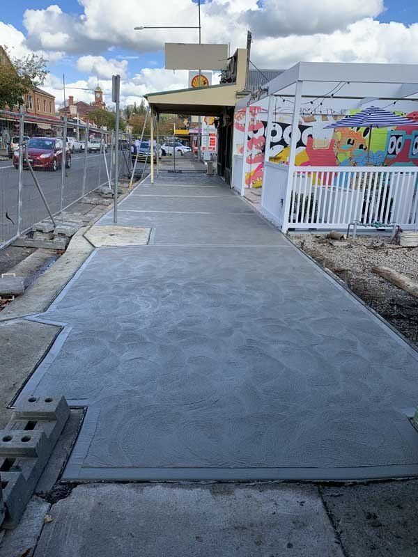 smooth winding concrete pathway