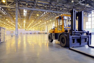 Loader in Modern Storehouse — Worcester, MA — Worcester Truck Co Loader in Modern Storehouse — Worcester, MA — Worcester Truck Co