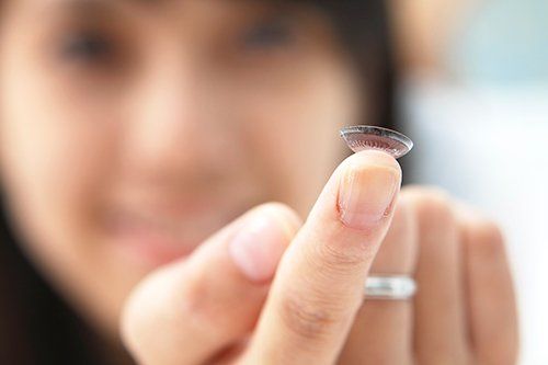 A woman who received an contact lens from our eye doctor in Clarksville, TN A woman who received an contact lens from our eye doctor in Clarksville, TN