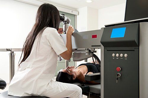 a woman undergoing ophthamology test a woman undergoing ophthamology test
