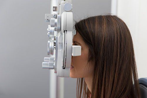 A woman being treated by an ophthalmologist in Clarksville, TN A woman being treated by an ophthalmologist in Clarksville, TN