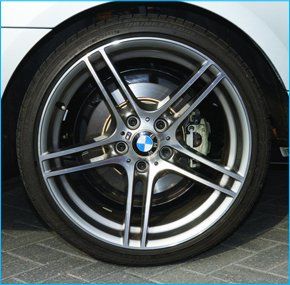 Corporate and executive express alloy wheel services from Motorcolor (Southampton) Ltd A five spoke BMW alloy fitted and polished by professional mechanics