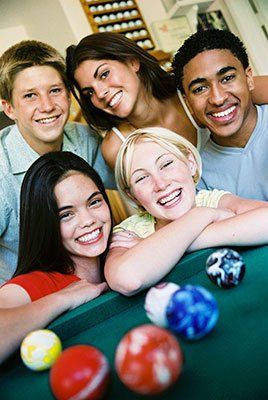 Couples playing billiard - Billiard room in Dover, PA Couples playing billiard - Billiard room in Dover, PA