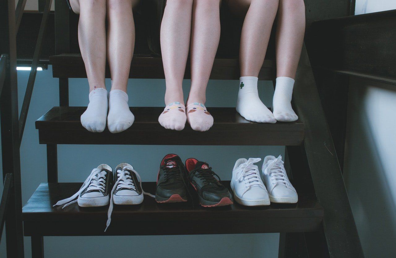3 adolescents and their shoes