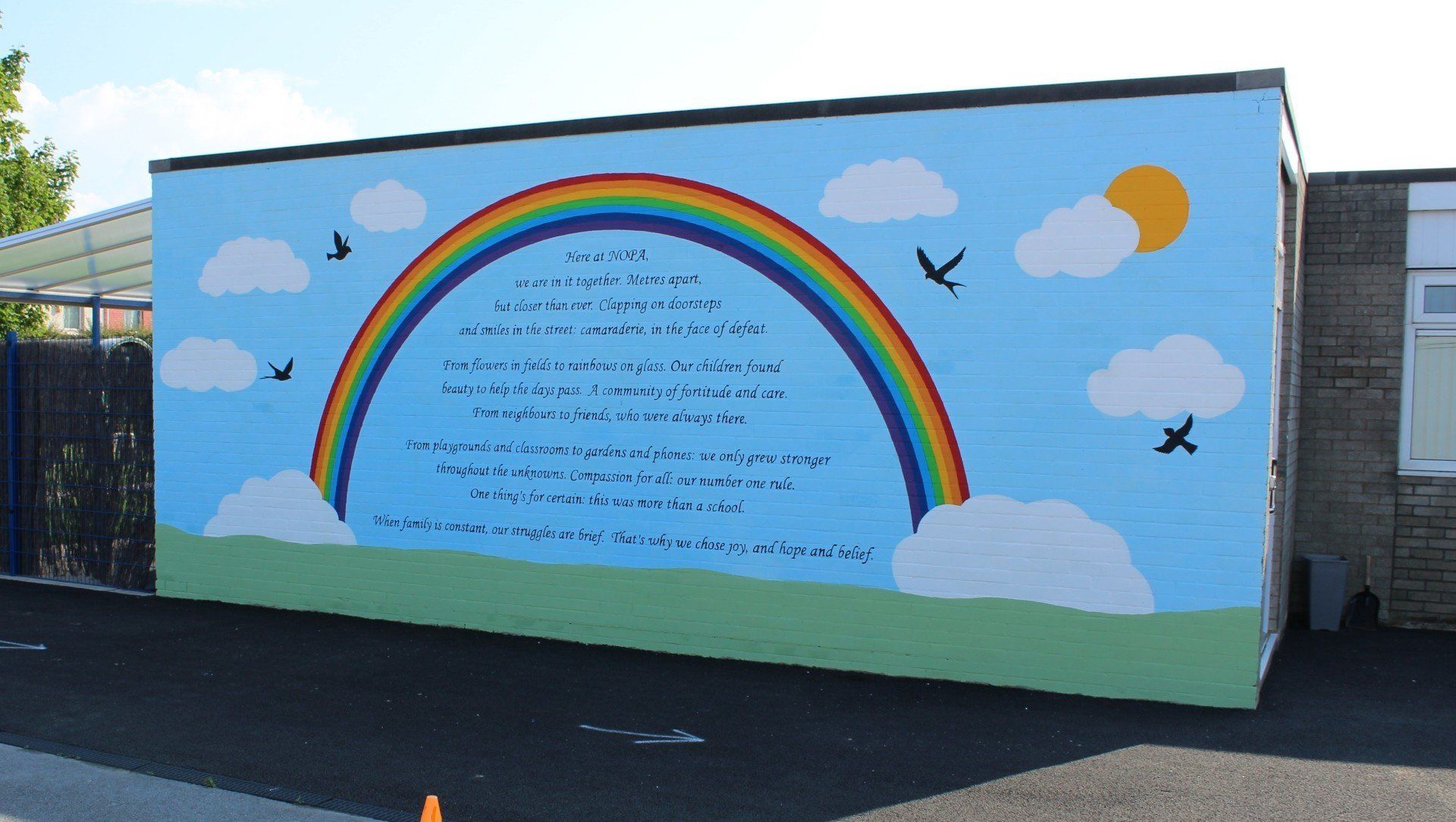 primary schools tribute to covid19 with a poem and a rainbow mural 