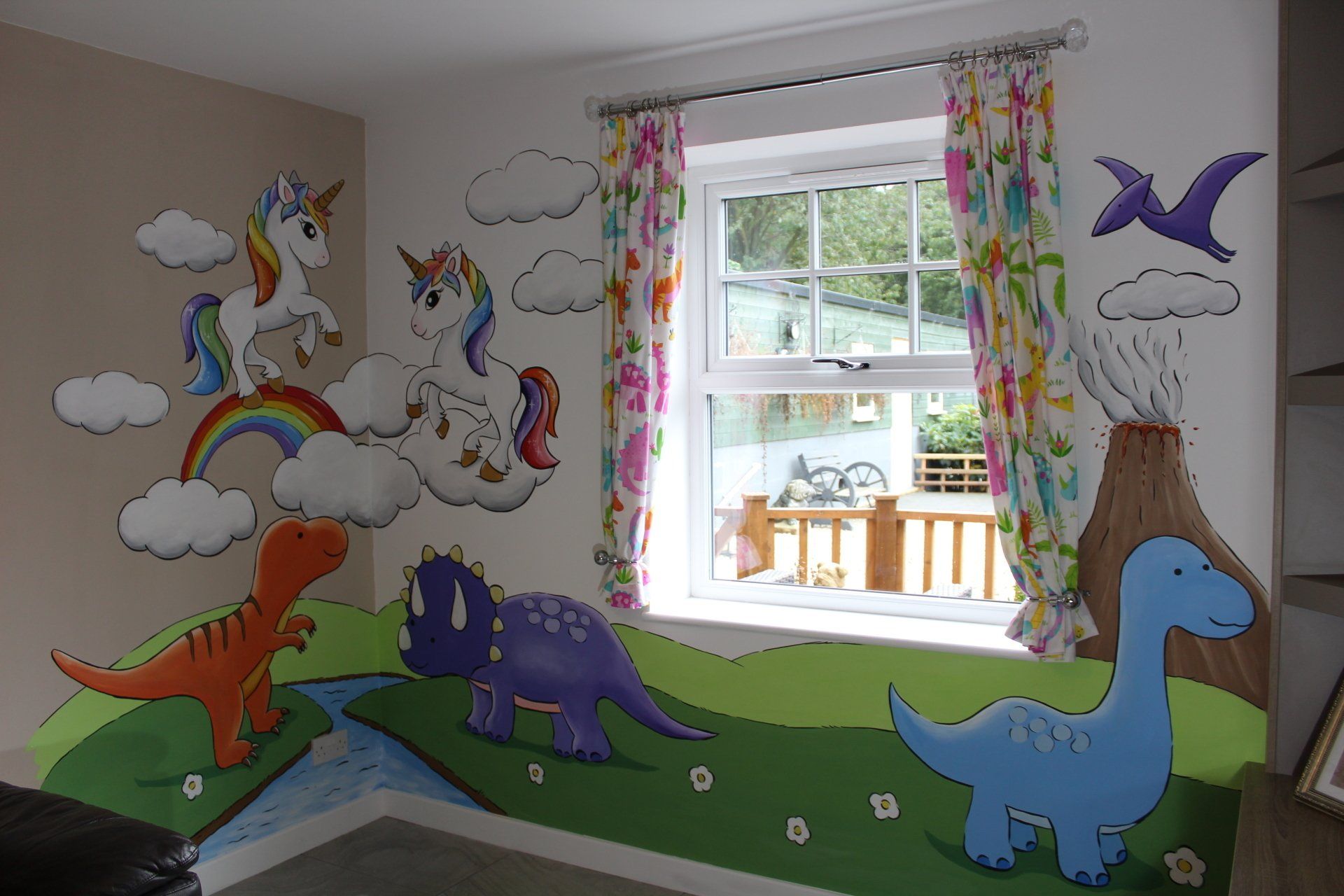 unicorns and dinosaurs play room mural 