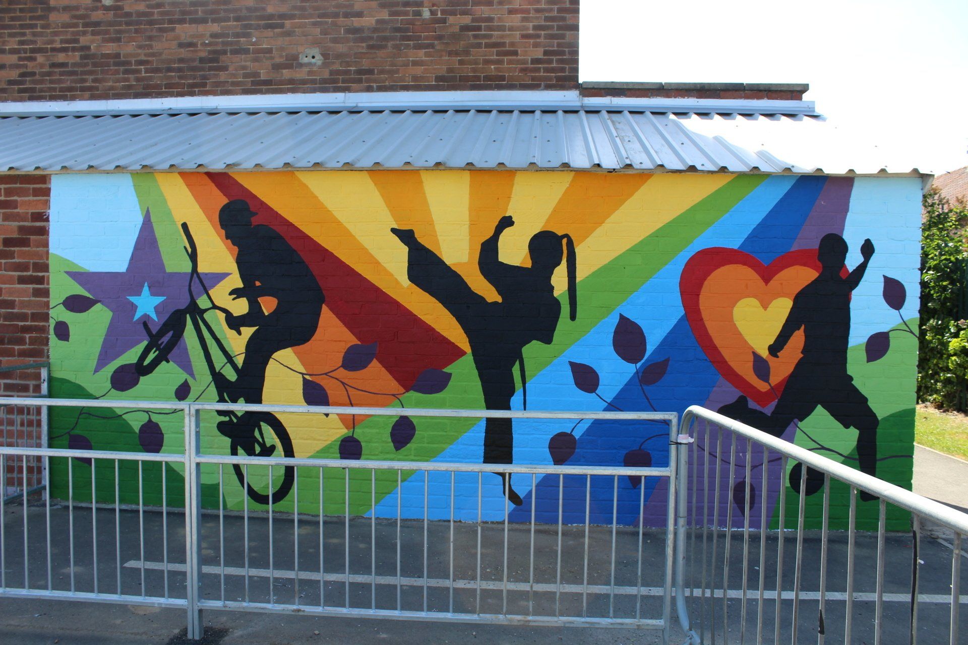 colourful bike shed mural at a primary school 