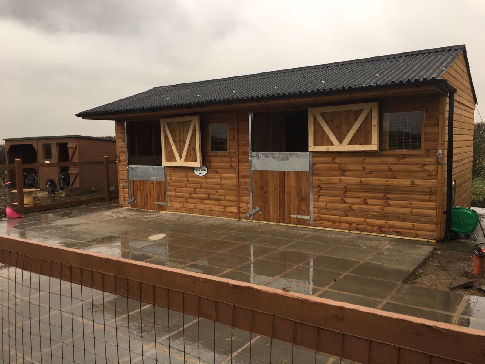 open stable doors on a wooden stable