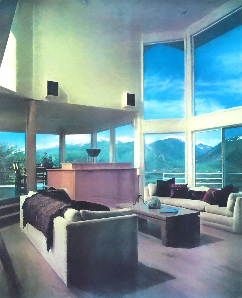 A living room with a lot of windows and a couch
