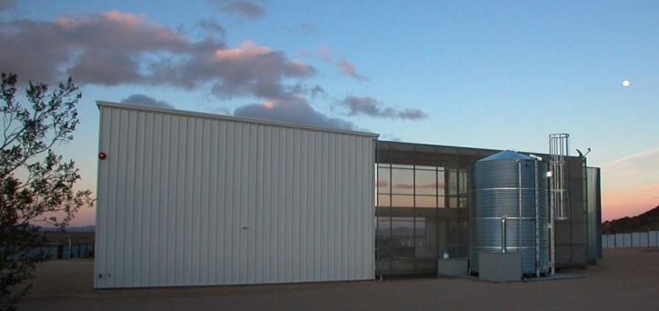 Shipping Container Home with a Water Tank