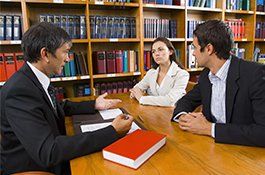 Couple talking to a lawyer | Lenway Law Office - Austin, MN Couple talking to a lawyer | Lenway Law Office - Austin, MN