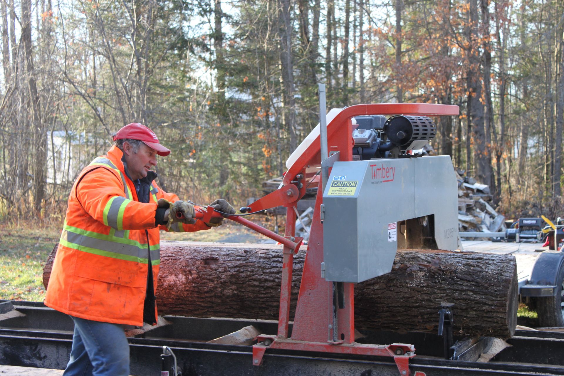 Bruce McEwen sawing on a Timbery Portable Sawmill