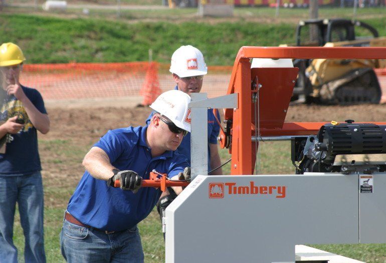 Timbery M285 Portable Sawmill with sawyer