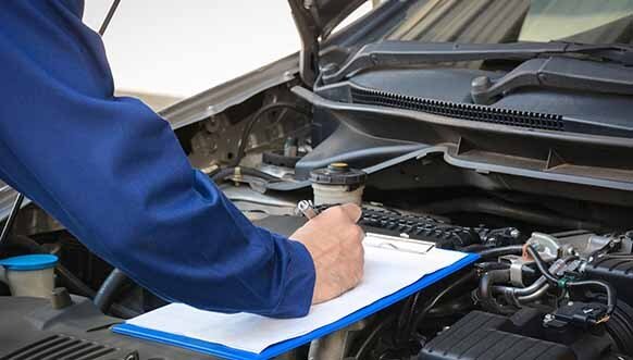 Mechanic Checking Car Engine — Mechanic in Caloundra, QLD Mechanic Checking Car Engine — Mechanic in Caloundra, QLD
