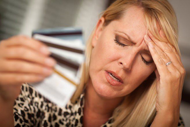 Woman With Debt — Florissant, MO — Ardmore Finance Corporation Woman With Debt — Florissant, MO — Ardmore Finance Corporation