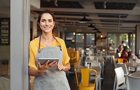 Business Owner at Entrance Door — Kingston, NH — Kingston Insurance Business Owner at Entrance Door — Kingston, NH — Kingston Insurance