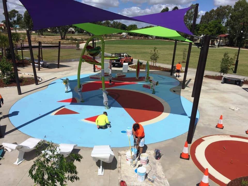 Concreters in Toowoomba building playground
