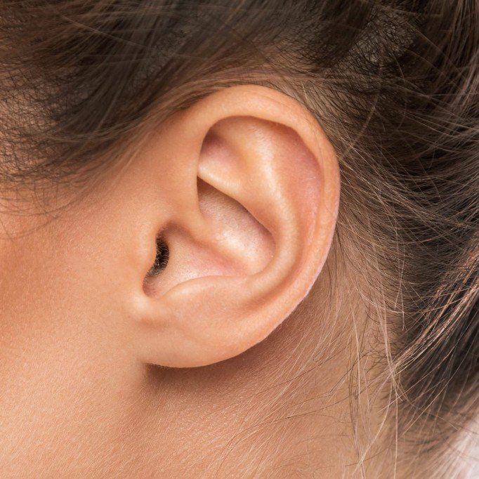 close up of a womans ear