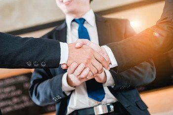 Business handshake of congratulations to work together smoothly and applause congratulations. Business cooperation.