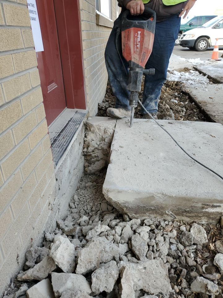 ADA access ramp built - destruction of concrete
