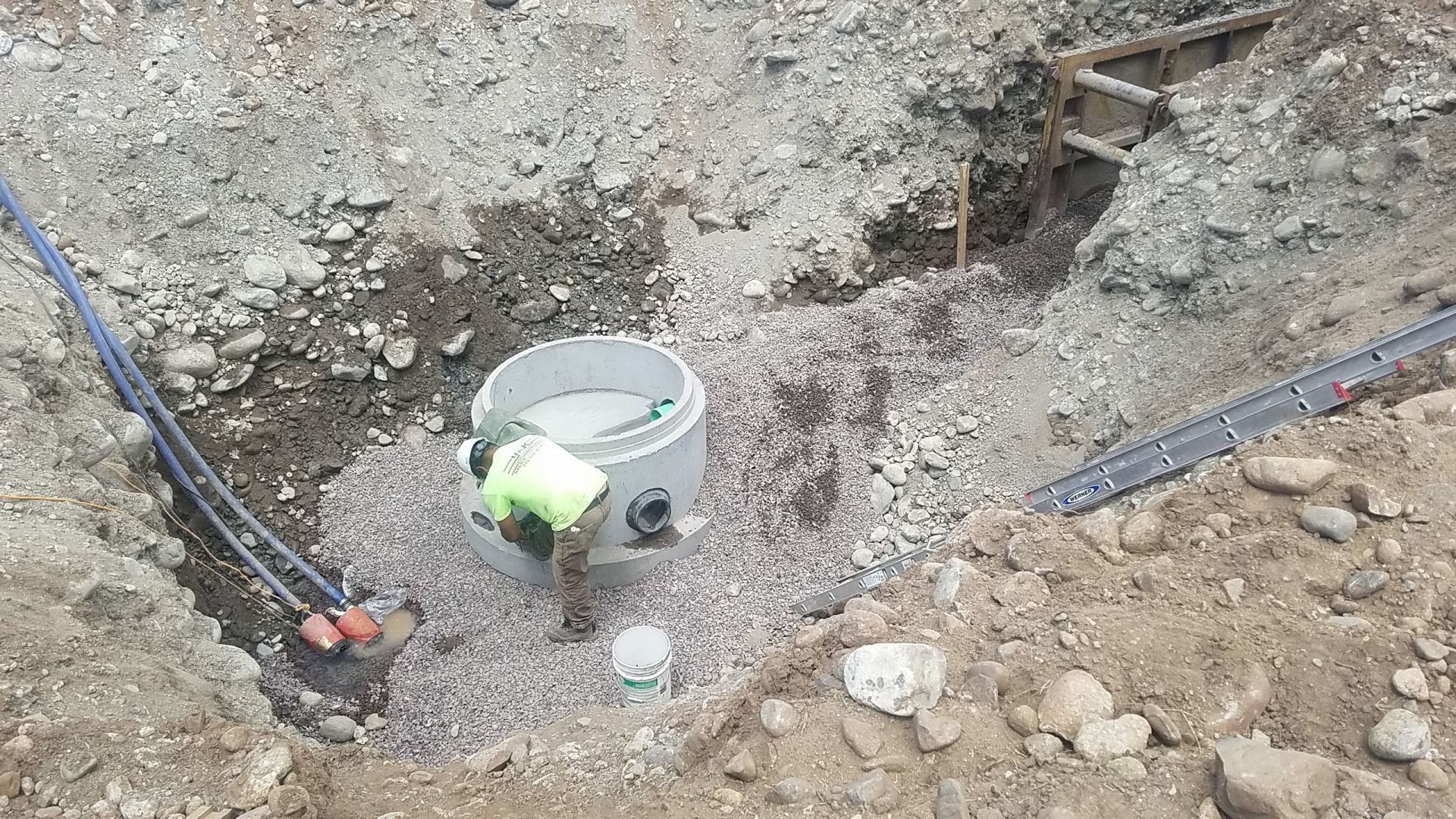 Tanks being installed with water lines