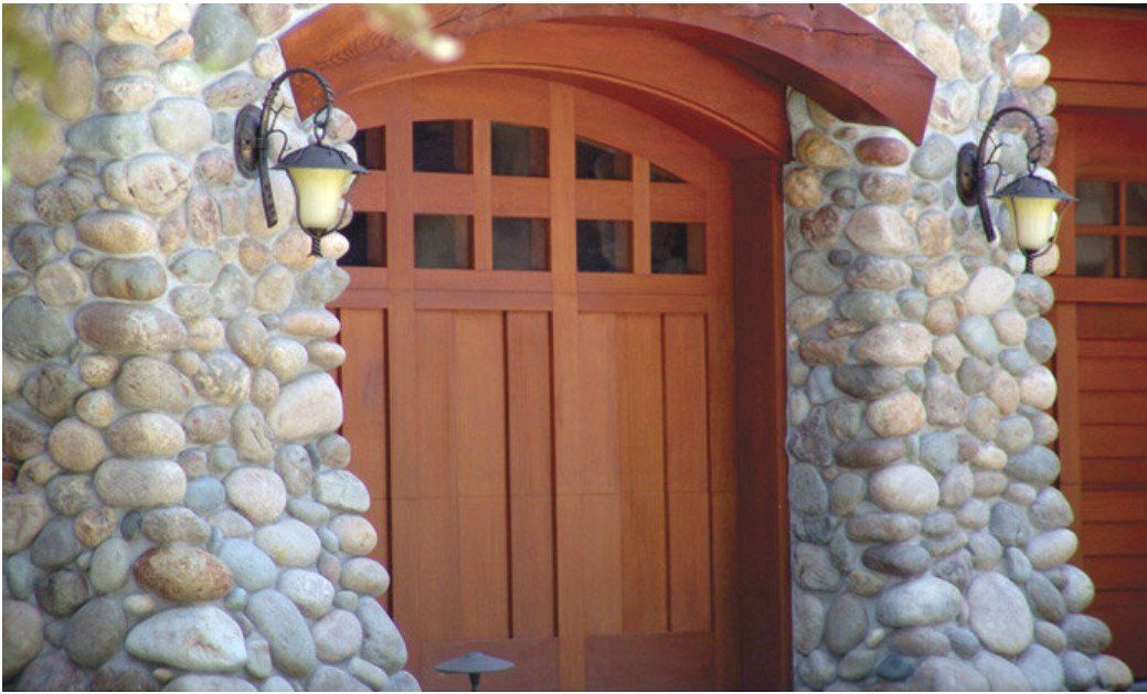 Wooden swing-out garage door