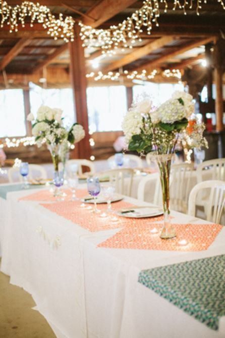 a table with a vase of flowers on it