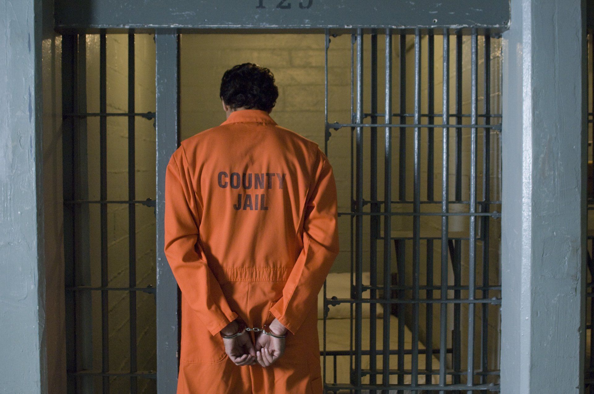 Bail Bonds Now — Handcuffed Prisoner in Jail in Overland Park, KS Bail Bonds Now — Handcuffed Prisoner in Jail in Overland Park, KS