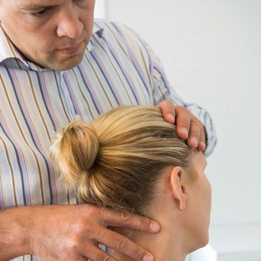Adrian Chiropractor Treating Patient