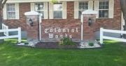 Colonial Woods sign at mobile home park