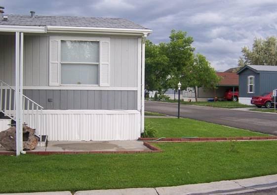 Side of a mobile home at Grantsville Village MHP in Utah