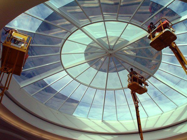 workers tinting glass