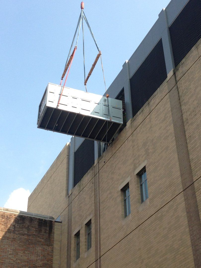 Lifting a Container — Poughkeepsie, NY — OCS Industries, Inc.
