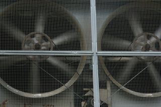 Air Conditioning Cages — Air Conditioning Fans on a Cage in Jacksonville, FL Air Conditioning Cages — Air Conditioning Fans on a Cage in Jacksonville, FL