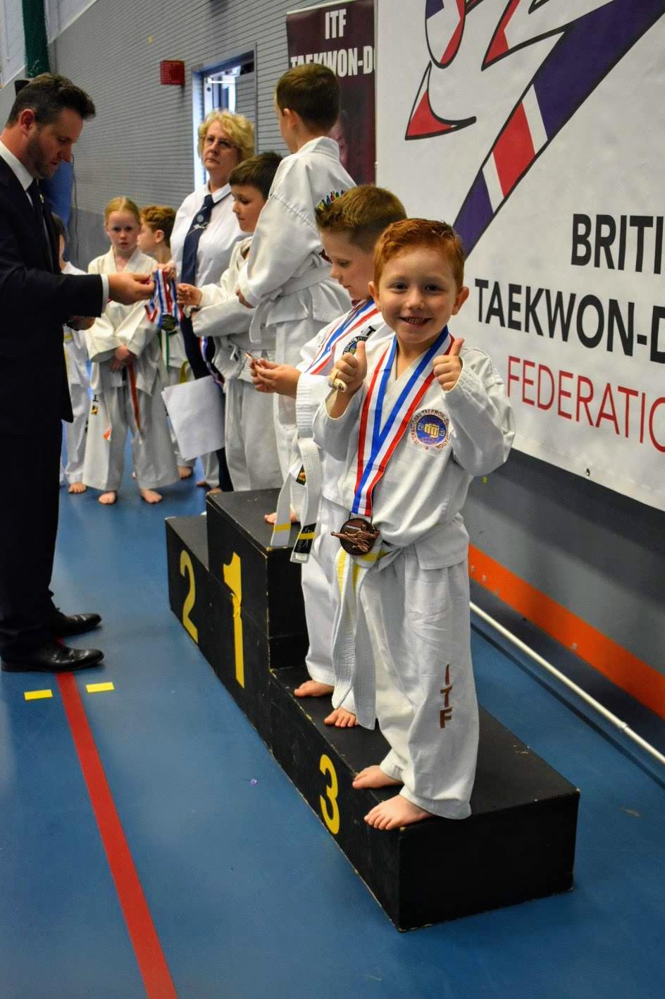 Young Martial Arts student thumbs up